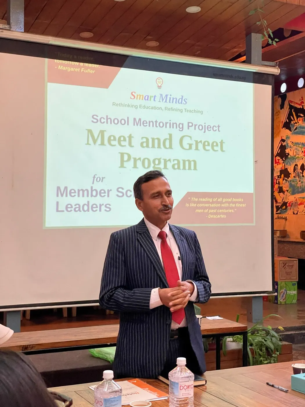 Guest speaker addressing school leaders at the Smart Minds SMP Meet & Greet