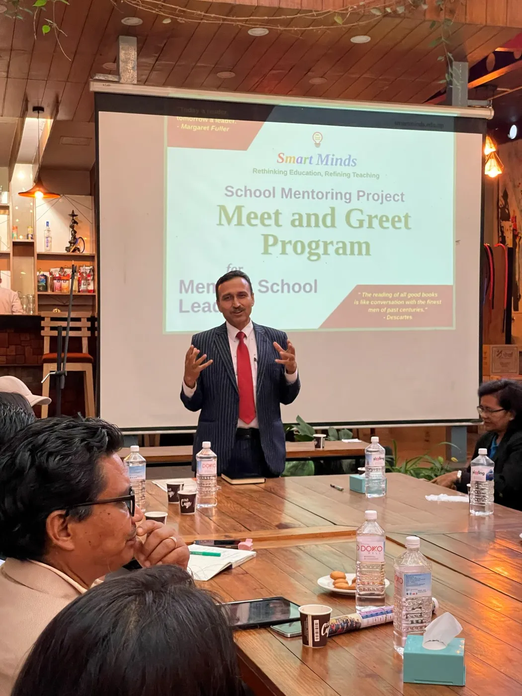 Guest speaker engaging SMP member school leaders during the program