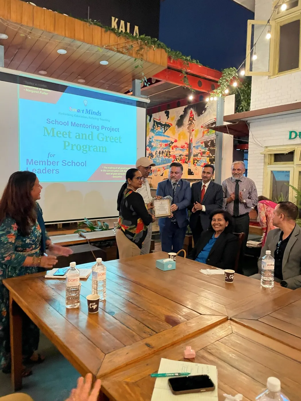 Smart Minds presenting a token of appreciation to a guest speaker